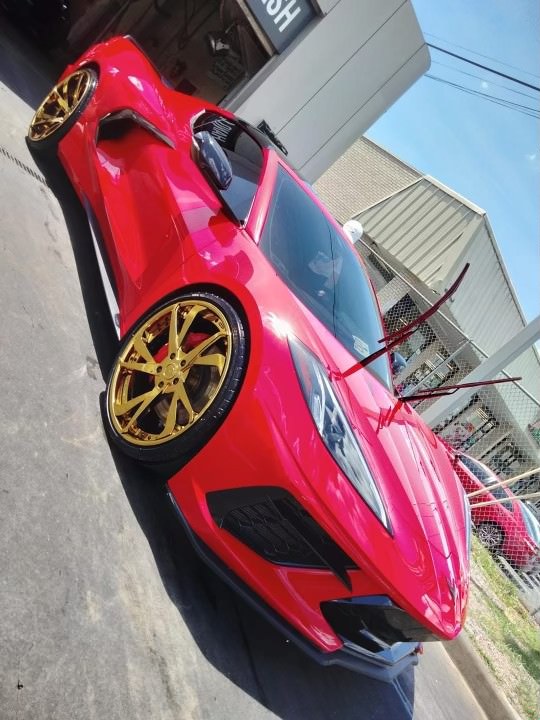 Bright red Corvette polished to a mirror finish